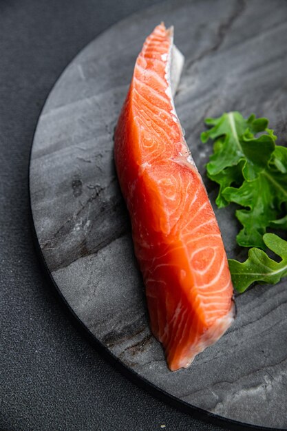 salmon raw piece fish fresh seafood meal food snack on the table copy space food background rustic