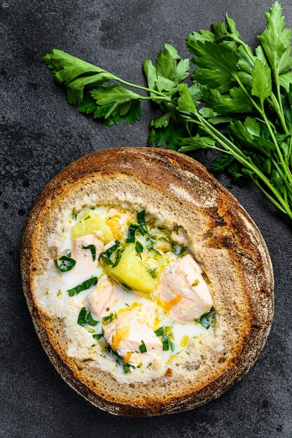 Salmon soup served in bread