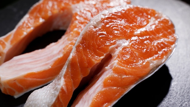 Salmon sushi on black dish in the restaurant selective focus