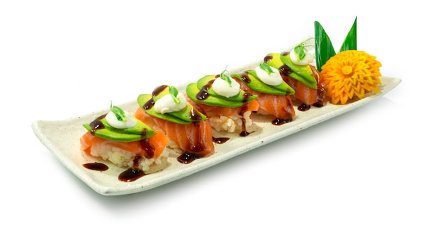 Salmon Sushi Nigiri ontop Avocado And Sauce Japaneses Food Style sideview