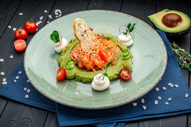 Salmon tartare with avocado puree