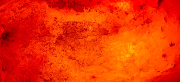 Photo salt lamp the texture of the salt lamp rock orange close up blurred background