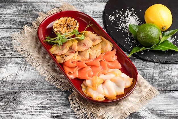 Salted fish several types of fish appetizer on a white background side and top view