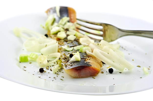 Salted herring on the plate