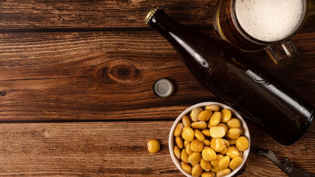 Salted Lupin Beans with beer on table with copy space