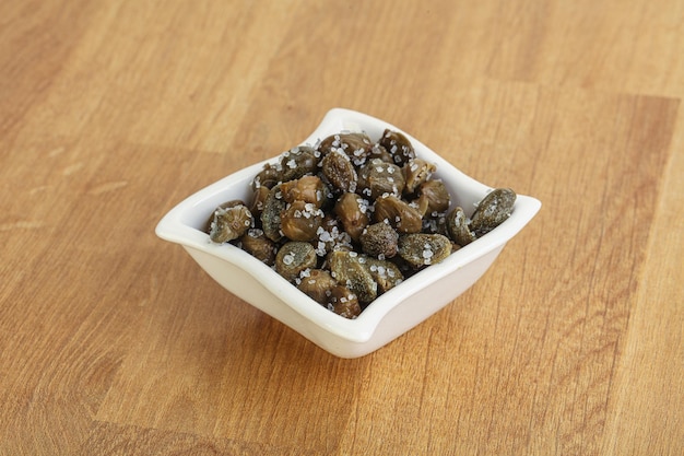 Salted marinated capers snack appetiser