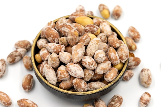 Salted peanuts kernel on a white background Closeup local name tuzlu yer fistigi