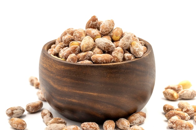 Salted peanuts kernel on a white background Closeup local name tuzlu yer fistigi