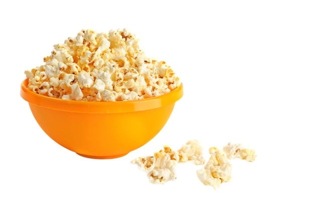 Salted popcorn grains in the yellow bowl