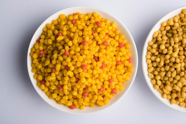 Salty or Kara Boondi or khari Bundi - A traditional Indian namkeen or snack and important Chat item, Served in a plate or bowl. selective focus