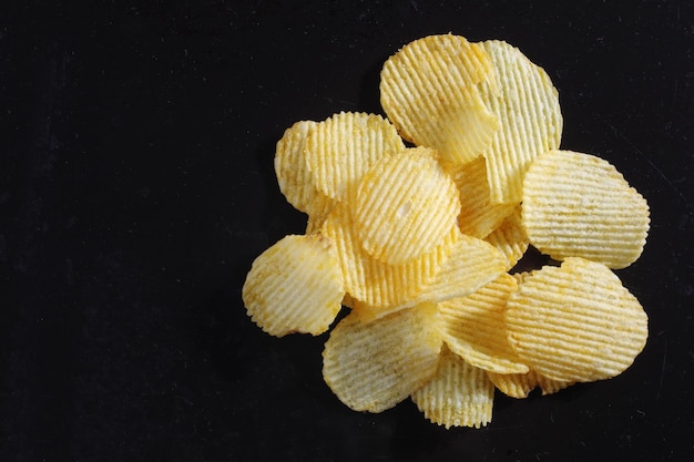 Salty ribbed potato crisps