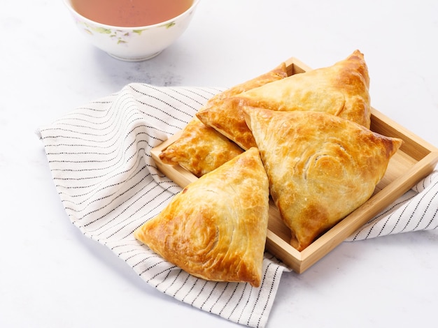 Samosa samsa meat stuffed pies oriental style Uzbek national dish samosaSamosa samsa meat stuffed pies oriental style Uzbek national dish samosa