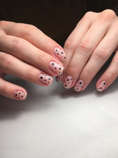 Sample of nail design on female hands.