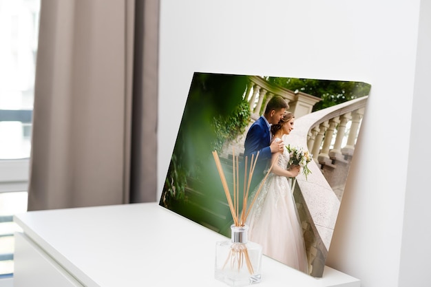 Photo sample of photography with gallery stretch on a wooden frame. printed wedding photo on canvas