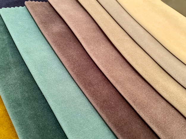 Samples of fabric for decorating the medel, curtains. dark shades of fabric. Background, texture