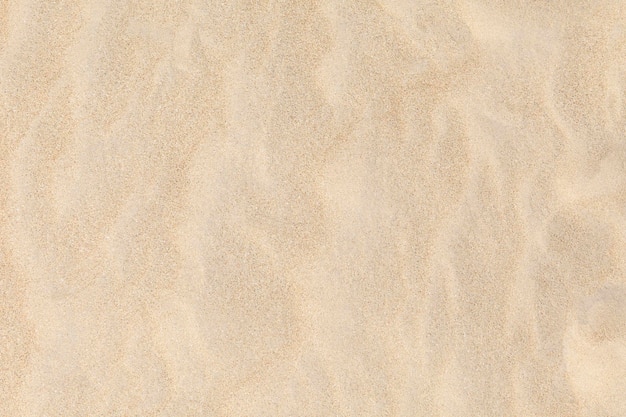 Photo sand background sand texture fine sand in the summer sun