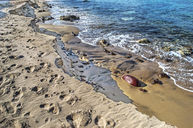 Sand and rocks in Castelsardo shore Sardinia