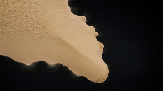 sand scattered isolated on black background and texture copyspace