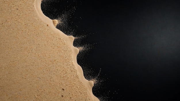 sand scattered isolated on black background and texture copyspace