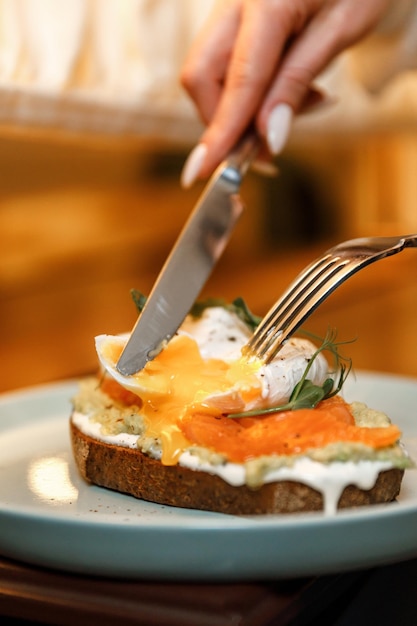 Sandwich on bread with poached egg