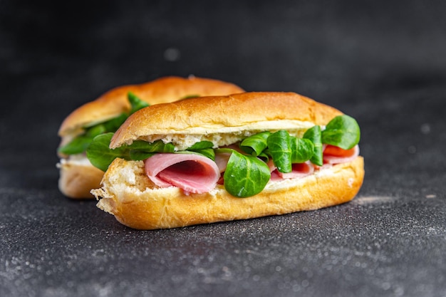 sandwich french milk buns ham, cheese, lettuce green leaves bio product fresh healthy meal food