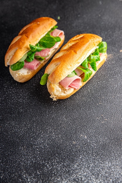 sandwich french milk buns ham, cheese, lettuce green leaves bio product fresh healthy meal food