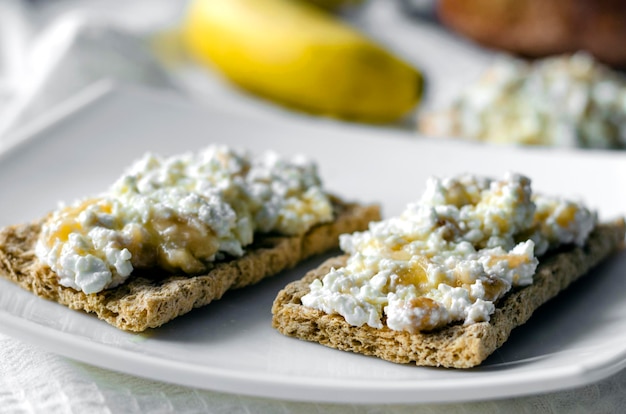 Sandwich with cottage cheese honey and banana on a diet bread