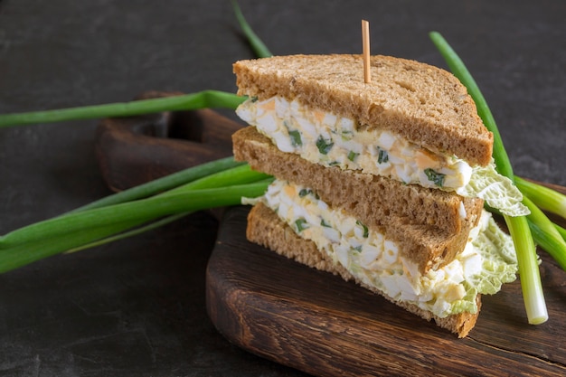 Sandwich with egg salad on wholegrain bread. close up