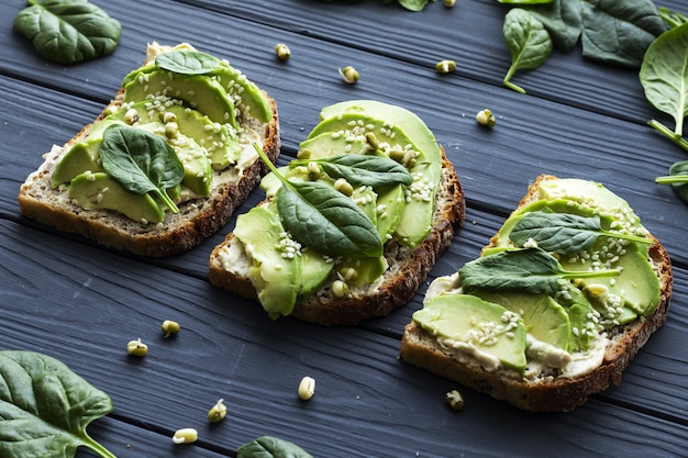 Sandwiches with avocado and spinach