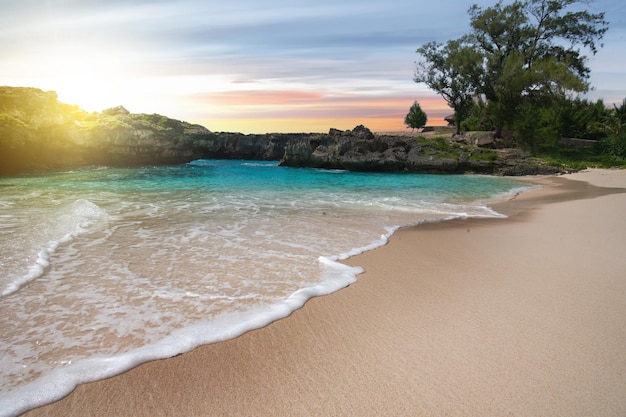 Sandy beach with the blue ocean