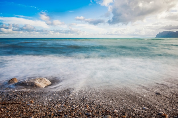 Sandy beach with mountains