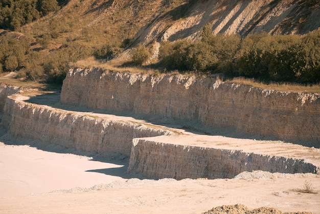 Sandy quarry under bright midday sun