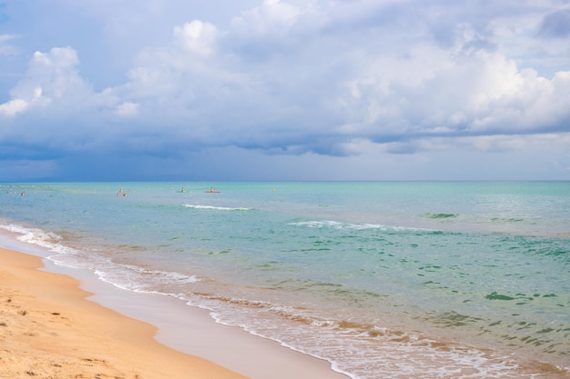 The sandy shore of the Black Sea on a summer day The sea and the sky with clouds