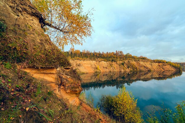 The sandy shore of a mountain lake in the fall .Leningrad region.