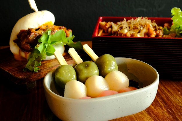 Sanshoku Dango (Three Colored Dumplings) and japanese tea, Cherry-blossom viewing image.