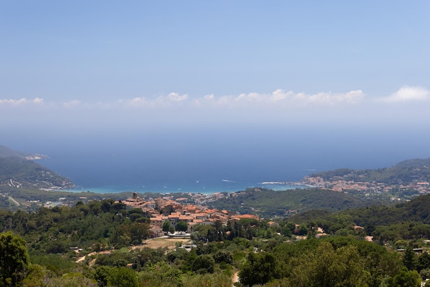 Sant'ilario in Campo and Biodola facing gulf of Marina di Campo, Island of Elba, Italy