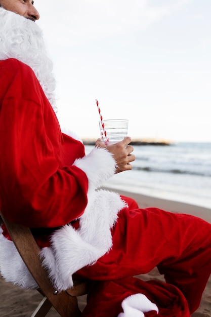 Santa claus at beach side view