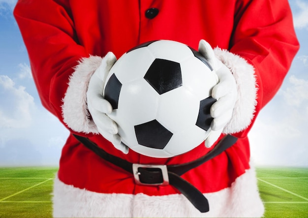 Santa claus holding a football