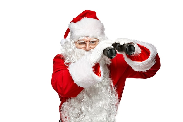 Santa Claus looking through binoculars