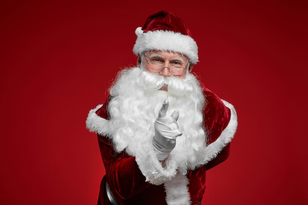 Santa Claus pointing at you