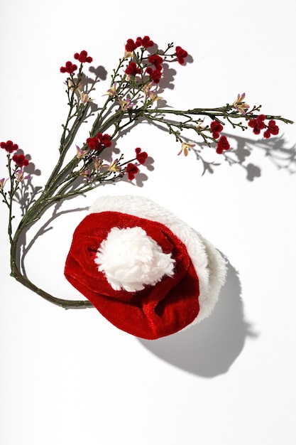 Santa Claus red hat isolated from above on colorful background