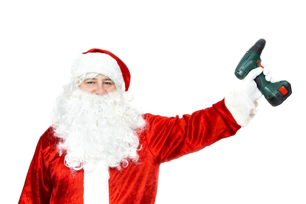 Santa Claus with a screwdriver. Isolated on white. Construction theme on the eve of Christmas.