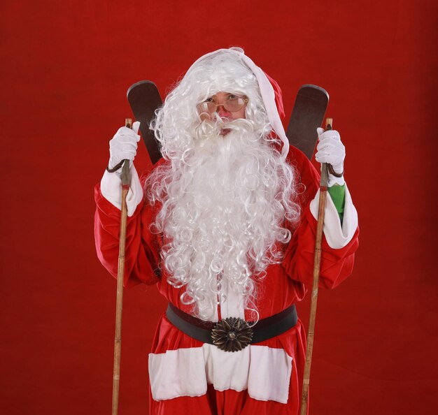 Santa Claus with ski poles