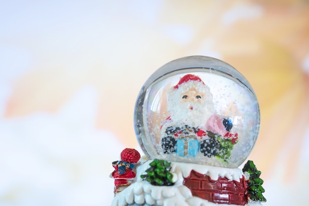 Photo santa in crystal ball, christmas concept.