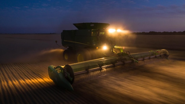 Santa Fe, Argentina, May 5, 2021: Harvester from a drone. Long exposure photography.