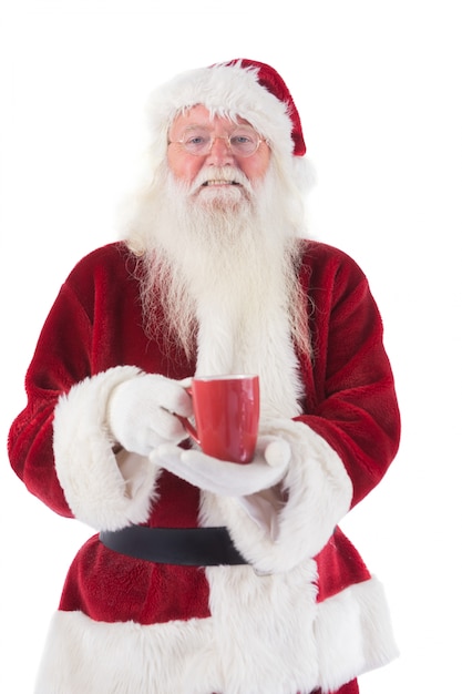 Santa holds a red cup