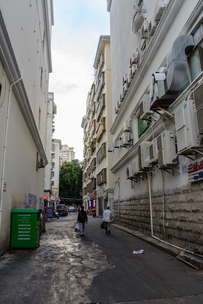 Sanya, Hainan, China - January 8, 2020: Ordinary life in the resort town of Sanya, Hainan Island, China. Street in Sanya City.