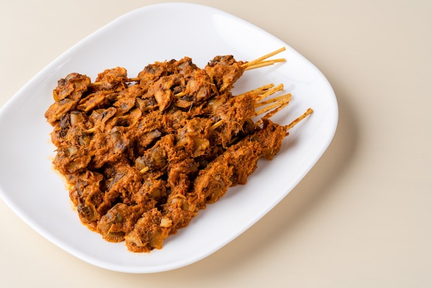 Sate Kerang Or Satay Kerang is a Traditional Indonesian Food made from Shell and covered with sauce