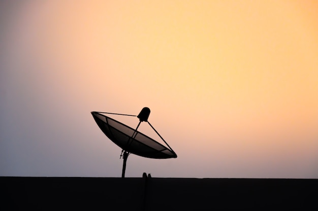 Satellite shadow orange sky background