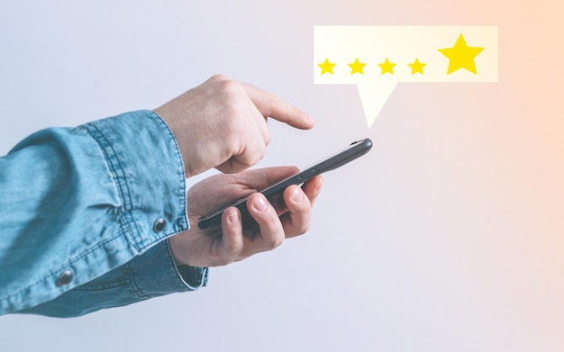 Satisfaction survey customer giving a 5star rating to a service performed with a smartphone